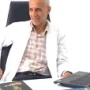 Dr. Kroosh Busaidi